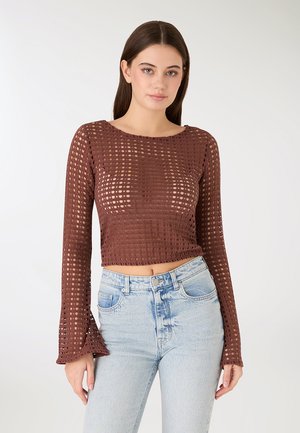 - Bluzka z długim rękawem