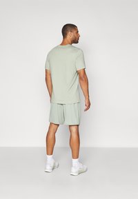 Nike Performance TOTALITY - Sportiniai šortai - jade horizon/black