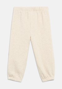 Απαλά μπεζ παιδικά παντελόνια φόρμας με ελαστική μέση και τελειώματα, τοποθετημένα επίπεδα σε λευκό φόντο.