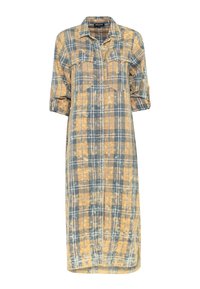Abito camicia a quadri nei toni di giallo e blu, lungo, con due tasche sul petto, chiusura frontale a bottoni e maniche arrotolate. Tessuto morbido con una vestibilità rilassata.