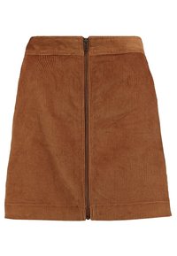 Gonna in corduroy marrone con vita alta, texture a righe verticali e chiusura con zip centrale sul retro. Linee pulite e dettagli minimi.