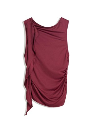 Burgundy sleeveless top with draped design, soft fabric, and ruched side detailing. Features a round neckline and flowing texture.