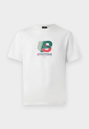 T-shirt en coton blanc avec un design graphique coloré comportant le texte "ATHLÉTIQUE" et des noms de villes en accents rouge, vert et bleu.