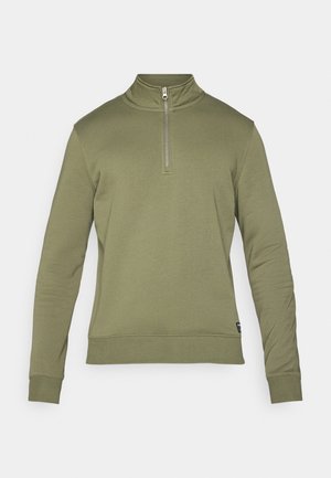 Olive green pullover sweatshirt with a high neck and half-zip closure. Features long sleeves and ribbed cuffs, made from a soft fabric.