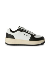 Low-top sneaker in black and white with thick beige sole, white laces, and Champion logo on side and sole, shown in profile view.