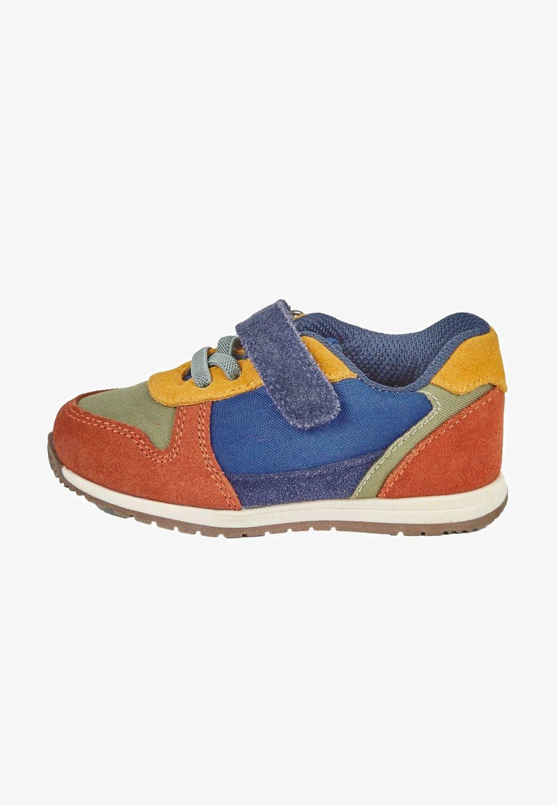 Mitmekesise värviga sneaker, mis sisaldab nahk- ja võrgumaterjale. Disain sisaldab oranžist, rohelisest, sinisest ja kollasest osadest koosnevaid sektsioone ning Velcro rihma.