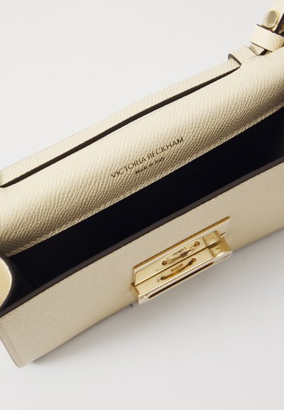 Victoria Beckham BBUCKLE NANO - Cross body bag - ivory