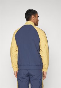 adidas Performance JUVENTUS TURIN SZN TRACK TOP - Klub merchandise - oat