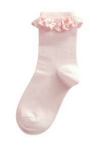 Calza di cotone rosa chiaro con bordo arricciato in pizzo. La calza presenta una superficie liscia e un design con punta arrotondata.