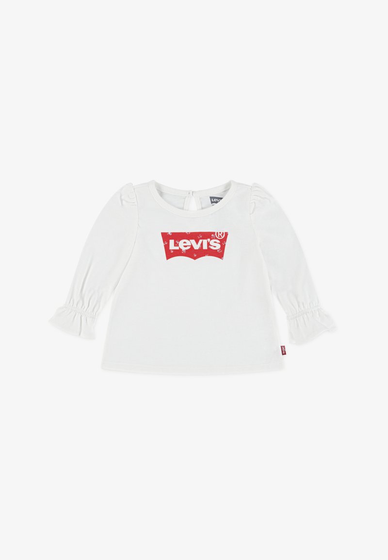Weißes Langarm-T-Shirt mit Rüschensaum, das ein rotes Levi's-Logo auf der Vorderseite trägt. Aus weichem Baumwollmaterial, mit rundem Ausschnitt und Schlüsselrückenverschluss.
