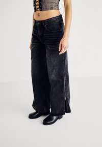 The Ragged Priest FERAL ZIP FLARES - Wide Leg - charcoal