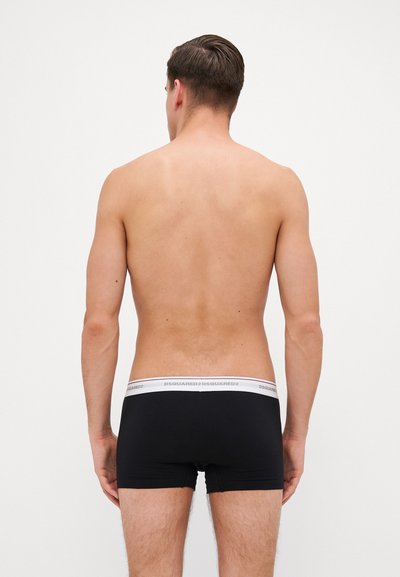 Black cotton boxer briefs with a white elastic waistband featuring the brand name "DSQUARED2," smooth texture, and a fitted design.