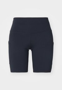 Pantalones cortos de ciclismo negros de cintura alta, confeccionados con tejido elástico que incluyen bolsillos laterales y costuras planas para mayor comodidad y durabilidad.