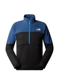 Fleece pullover in blue and black, with a half-zip design. Features ribbed texture on the black section and a contrasting blue collar.