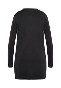 Tecido a maglia nero a maniche lunghe con scollatura rotonda, caratterizzato da una vestibilità ampia e polsini e orlo a coste. Texture liscia senza motivi visibili.