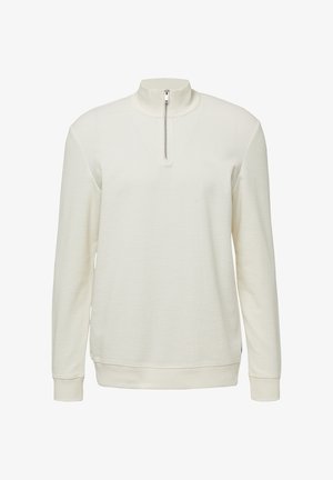 White pullover with a high collar and a short zipper, featuring a textured fabric and ribbed cuffs and hem. Subtle logo on front.