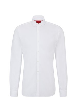 White long-sleeve shirt made of cotton with a button-up front, classic collar, and subtle texture, featuring a red logo on the inside collar.