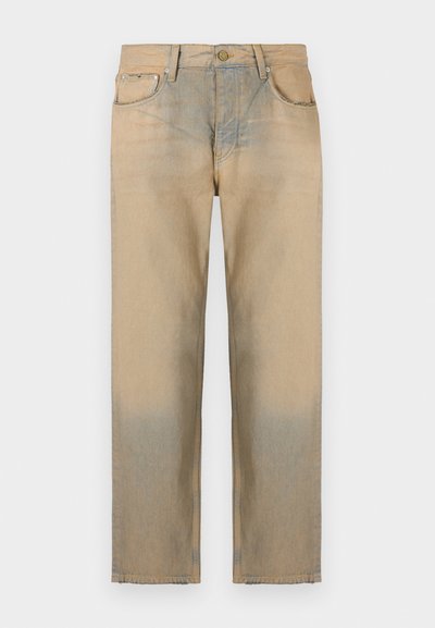 Beige denim jeans with a straight-leg design, featuring a faded effect at the bottom, five-pocket styling, and a button closure.