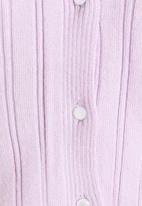 Light purple knitted cardigan featuring vertical ribbing and five round white buttons down the front. Soft texture with a fitted design.