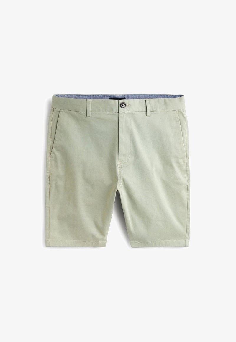 Shorts en coton vert clair avec une fermeture à bouton, deux poches latérales et une ceinture intérieure contrastante. Texture lisse et coupe ajustée.