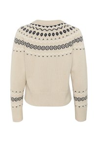 Pull en tricot beige au design court, avec un empiècement à motifs en marine, présentant des motifs géométriques et floraux le long de l'encolure et des manches.