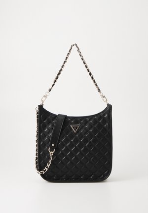 Borsa a tracolla nera trapuntata in materiale sintetico. Presenta una catena argentata, un dettaglio logo triangolare e una forma elegante e strutturata.