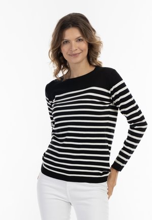 Pulover cu dungi alb-negru, cu mâneci lungi, decolteu rotund și manșete ribbate, asortat cu pantaloni albi. Textură netedă.