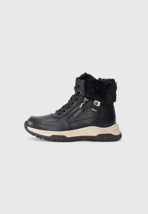 Scarpe alte nere con colletto in pelliccia sintetica, materiale in pelle, dettaglio con zip metallica e suola spessa beige e nera in gomma.