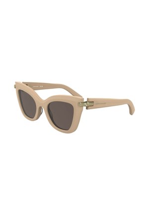Occhiali da sole in plastica beige con design a occhio di gatto, lenti scure, forma angolare prominente e dettagli metallici sulle cerniere.