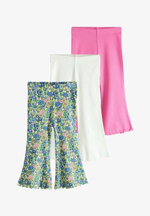 Three pairs of children's ribbed flare pants in floral print, white with multicolor specks, and solid pink, with lettuce-edge hems.