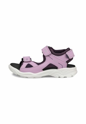Purple and black sports sandals with Velcro straps, a cushioned sole, and cutout details for breathability and comfort.