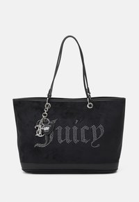 Black tote bag with dual thin shoulder straps, "Juicy" in rhinestones on front, and attached heart-shaped charm with metallic letter "J".
