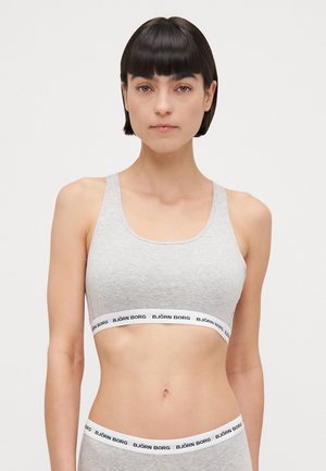 Gray sports bra with a smooth texture, round neckline, and wide BJORNE BORG branded elastic underband, paired with gray briefs.