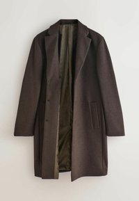 Dunkelbrauner Wollmantel mit Reverskragen, zwei Vorderentaschen und Knopfverschluss. Gefüttert mit einem strukturierten, olivgrünen Innenstoff.