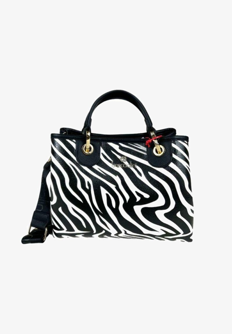 Black and white zebra print handbag with textured surface, gold-tone hardware, dual handles, and an adjustable strap.