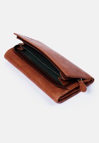 Brown leather wallet with a zip closure, featuring a green inner lining and a slim design. The wallet is partially opened, showing its interior.