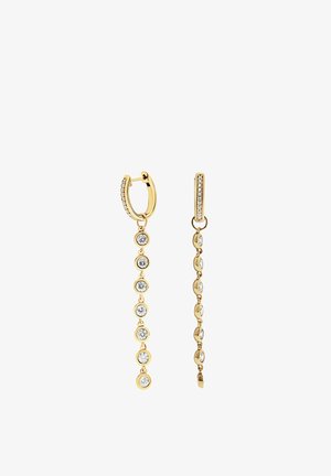 Gold hoop earrings with six round, bezel-set clear gemstones dangling in a vertical line on each earring.