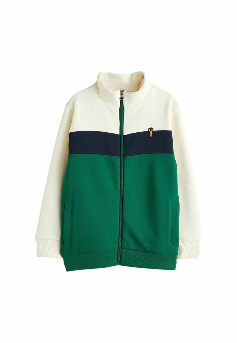 Veste zippée en blanc, marine et vert. Caractérisée par un col montant, des blocs de couleur horizontaux, des poches latérales et un petit logo en accent.