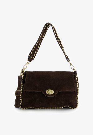 Dark brown suede handbag with gold stud accents along edges, adjustable strap, and gold twist-lock closure on front flap.