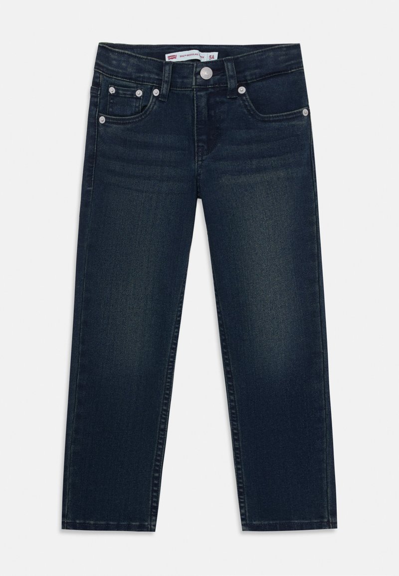 Jeans en denim bleu foncé avec une coupe droite, cinq poches et des accessoires métalliques. Légèrement décoloré à l'avant pour un aspect texturé.