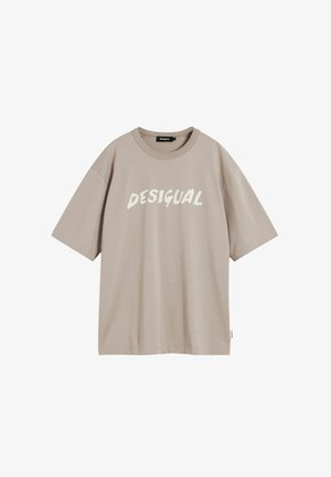 Beige, rövid ujjú pamut póló, melynek elején a "DESIGUAL" szó fehér, vastag betűkkel szerepel. Kerek nyakú, laza fazonú.