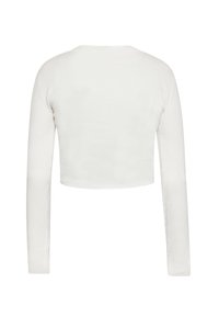 Top cropped bianco a maniche lunghe con texture a coste. Design semplice, con scollatura rotonda e maniche aderenti. Nessun motivo o accento visibile.