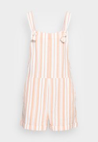 Salopette courte rayée en pêche clair et blanc, avec des bretelles nouées, des poches latérales et des ourlets roulés. Fabriquée en tissu léger.