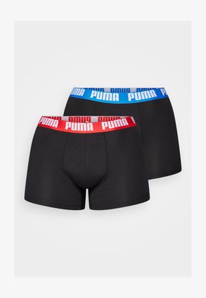 Zwarte boxershorts met rode en blauwe elastische taillebanden en het witte "PUMA" logo. Zacht materiaal met een klassieke, aansluitende pasvorm.