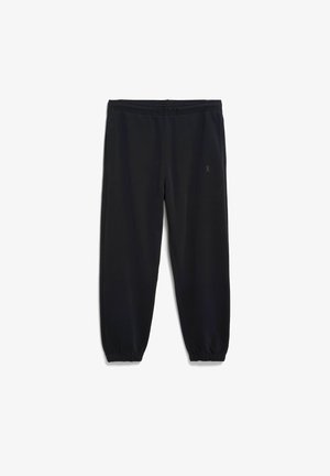 Zwarte joggingbroek gemaakt van zachte, rekbare stof. Heeft een elastische tailleband, taps toelopende pijpen en elastische boorden bij de enkels.