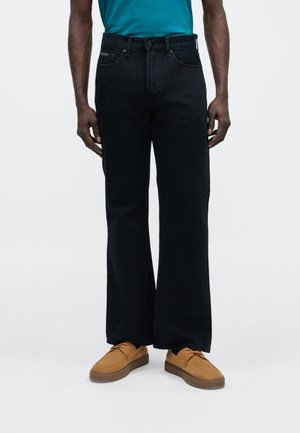 Sirgete säärtega teksad - blue black stone