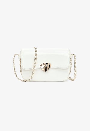 White rectangular shoulder bag with a gold chain strap and a marbled gold-and-black shield-shaped clasp on the flap.