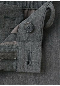 Gray fabric with a textured surface features a button closure and a zipper. A small loop detail is present near the waistband.