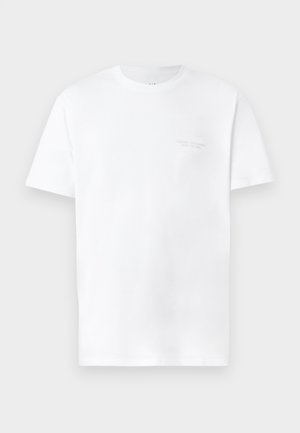 T-shirt bianco in cotone con maniche corte, scollatura tonda, caratterizzato da una stampa del logo grigio sottile sull'area sinistra del petto e una texture liscia.
