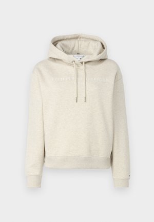 Felpa beige realizzata in morbido tessuto, con cappuccio regolabile tramite cordino e polsini a costine, caratterizzata da un logo bianco stampato sul davanti.